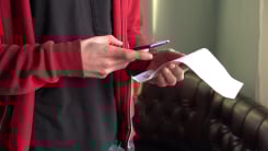 Person taking picture of receipt