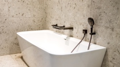 bathroom with freestanding tub