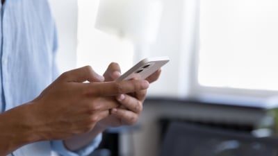 person texting on phone