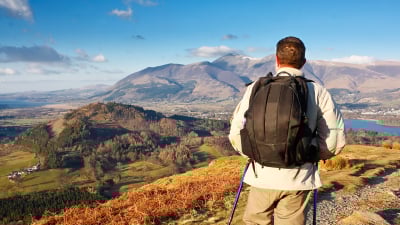 man with a backpack on a mountain
