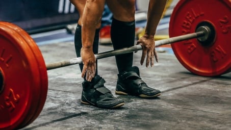 lifter preparing to lift weights