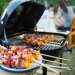 Close-up of kebabs on a charcoal grill.