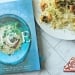 The Simple Art of Rice cookbook on a table with a plate of shrimp and rice.