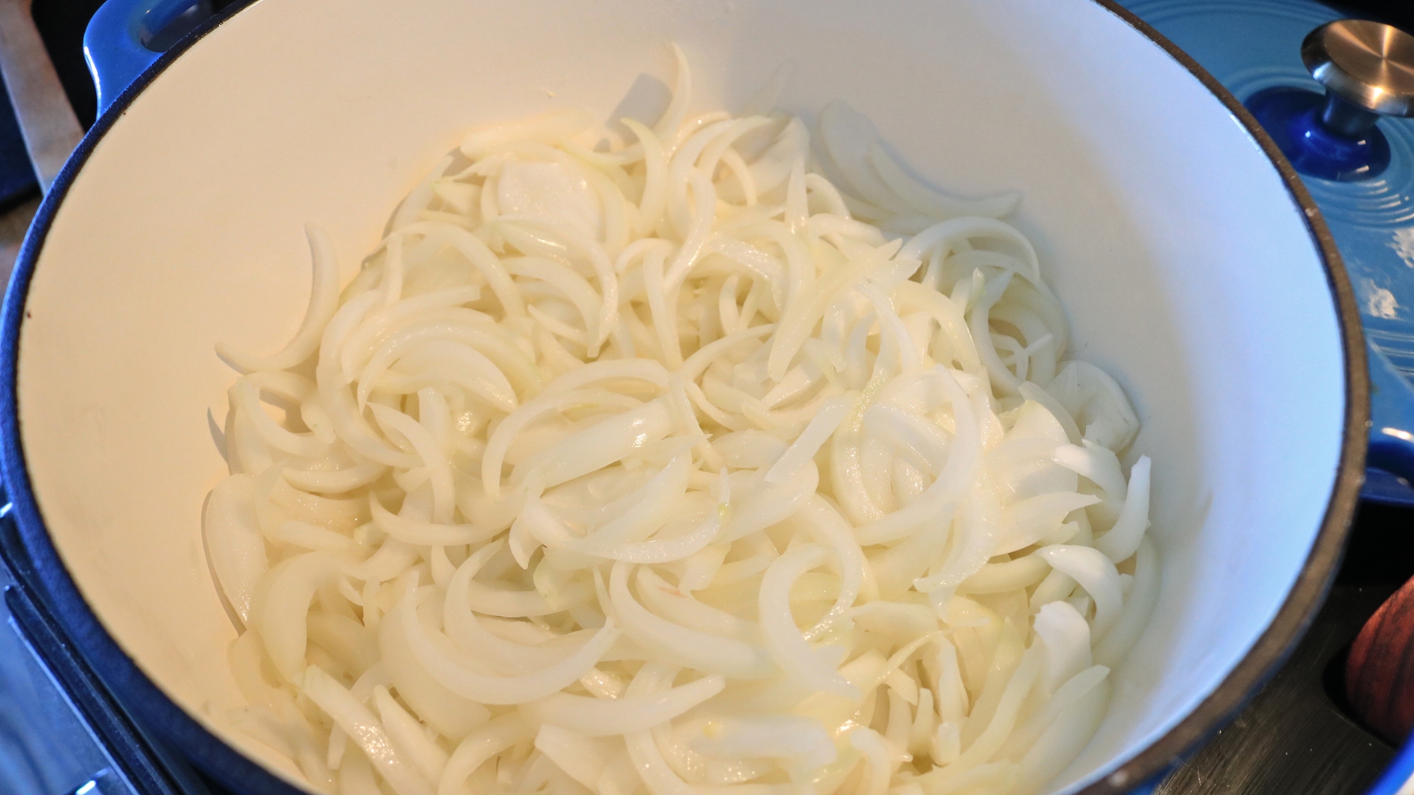 A pot of sliced white onions.