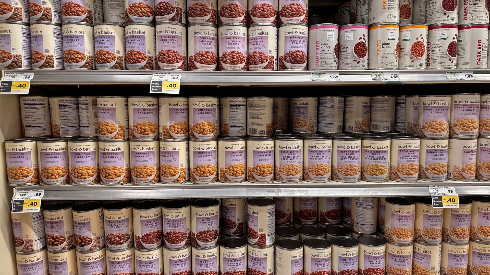 Cans of beans at the grocery store.