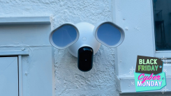 Arlo floodlight security camera installed on a house