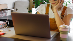 Young freelancer on laptop
