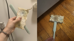 A sponge cleaning a fridge