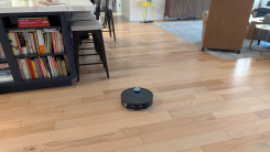 The dreame x50 ultra robot vacuum cleaner on a hardwood floor