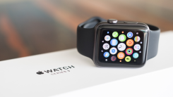 Apple Watch lying on its original packaging