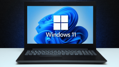 A laptop with the Windows 11 logo on it