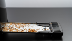 crumbs collected in a toaster tray