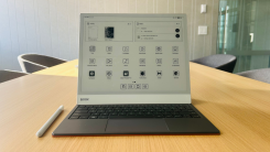The Boox Note Max on a desk docked with the keyboard cover