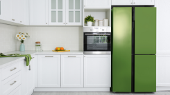 green refrigerator for pop of color in an otherwise neutral kitchen with white cabinets
