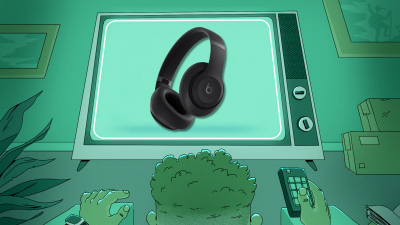 Man watching television screen displaying an  Beats Studio Pro.