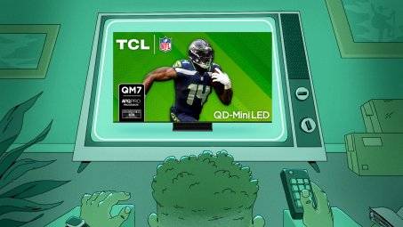 Man watching television screen displaying a TCL QM7 Class 55-Inch TV (55QM751G).