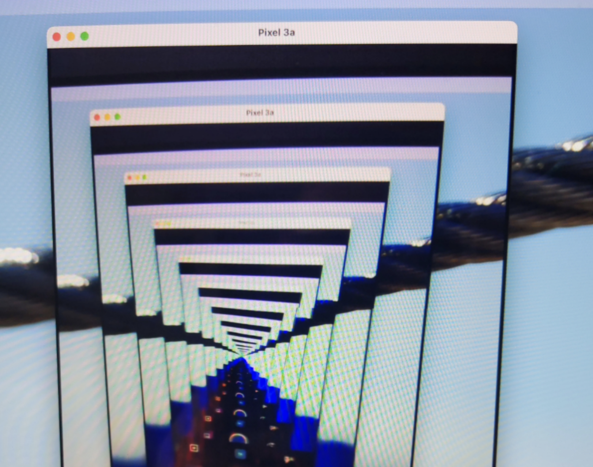 I pointed the Android camera app at my computer while the application is opening creating an endless tunnel similar to when two mirrrors are pointed at each other.